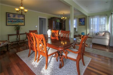 A view of the dining room space in the home's grea