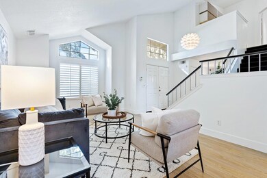 Formal living room looking towards entryway and st