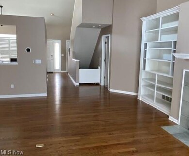looking toward front door from living area