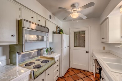 Kitchen with door to exterior