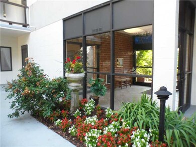 Exterior Front. FRONT ENTRANCE AND LUSH INTERIOR C