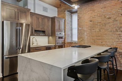 Haberdasher Square Lofts unit 107, Chicago, IL 60661 - photo 5