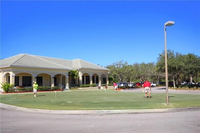 View of property's community featuring an area to practice putting
