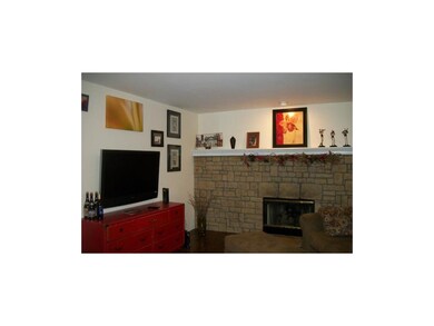 Functional family room with fireplace!  Mounted fl