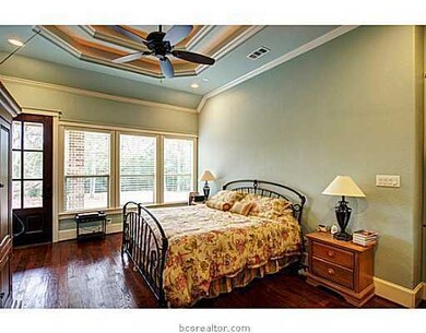 Master Bedroom. Hand scraped hardwoods, access to