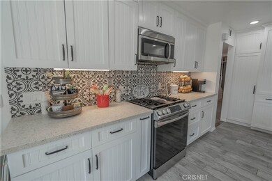 View of microwave and stove oven