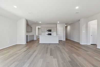 Open Floor Plan in the Harrison home plan by Trophy Signature Homes – REPRESENTATIVE PHOTO