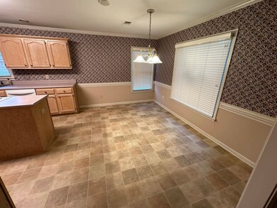 Unfurnished dining area with an inviting chandelie