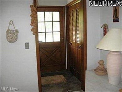 Foyer with large guest closet