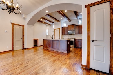 Spacious Mediterranean-style kitchen with an open
