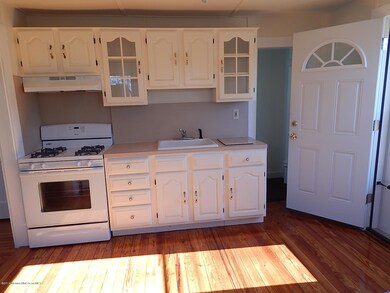 Kitchen Leading out to Large Back Deck