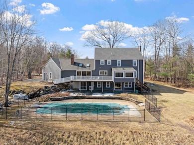 View w/ pool and back of home