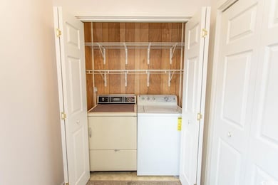 Laundry room featuring washing machine and clothes dryer