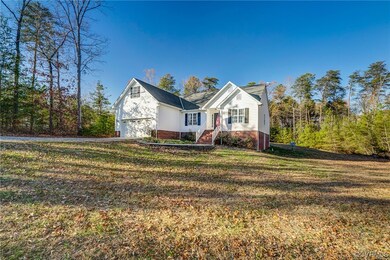 View of front property with a garage and a front l