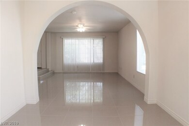 FORMAL DINING ROOM ACCENTED WITH ARCH!
