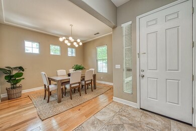 Formal dining room w/new light fixtures.