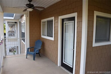 Balcony with exit/entrance door to condo