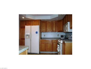 updated kitchen with recessed lights along with al