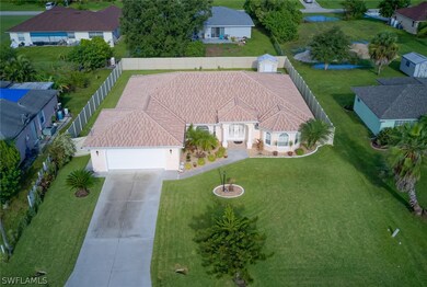 915 Apple Ave, Lehigh Acres, FL 33971 - photo 2
