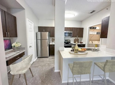 Kitchen featuring light hardwood / wood-style floo