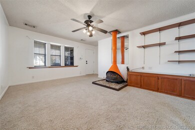 Living Room with built-in cabinet, floating shelve