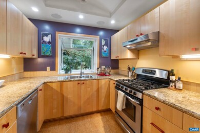 Maple cabinets, granite countertop, cork flooring