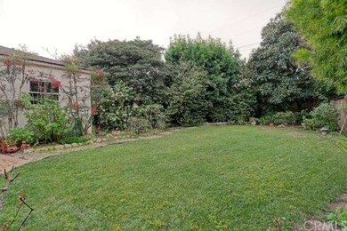 Gorgeous landscaped yard - imagine the summer gard