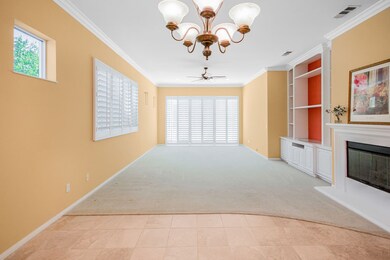 Living room with slider door to backyard