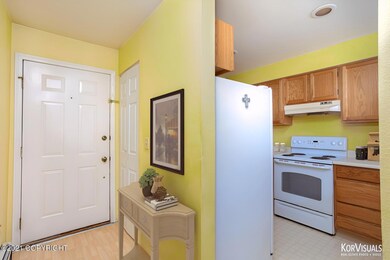 2830 Happy Lane #13-Entry_Kitchen_Staged