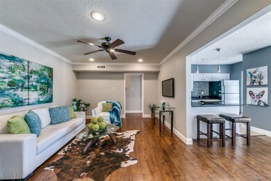 Living room featuring hardwood / wood-style floori