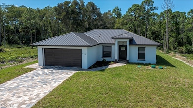 662 Foxchase Dr, Lehigh Acres, FL 33974 - photo 2