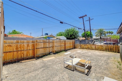 Fenced backyard featuring a patio