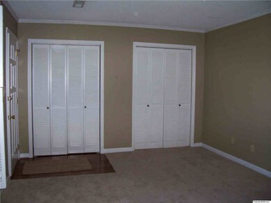 Dual closets next to front door. Could be used as coat closets or simply storage.