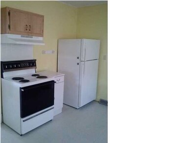Stove and refrigerator stay