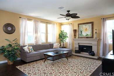 Spacious family room is open to kitchen.