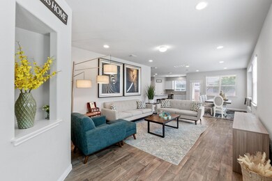 Living area with wood finished floors and recesse