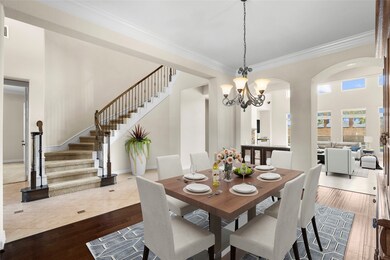STAGED PHOTO! The dining room is gorgeous with dar