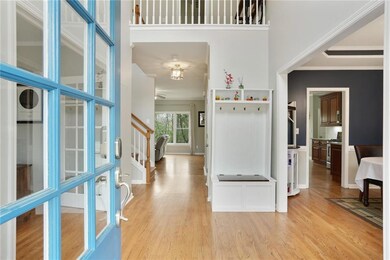 Entrance foyer with drop station and an inviting v