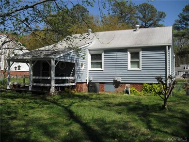 Rear of home and covered deck