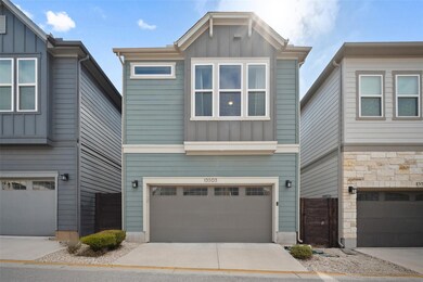 View of front of home featuring board and batten 