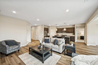 Living Room - photo is of a previous inventory home. Inquire for more details and options.