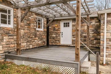 Stone Siding and Arbor