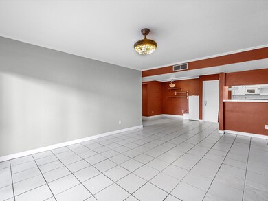 The living room nicely opens up to a dining area a