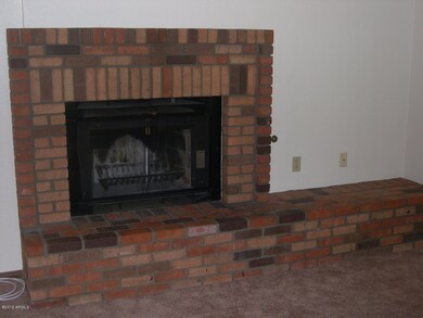 Brick faced, wood burning fireplace