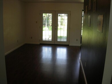 Living Room with new french doors leading to the c