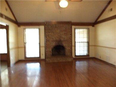 Greatroom with wood floors and fireplace