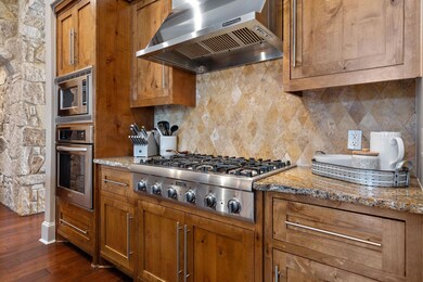Kitchen with ventilation hood, stainless steel ap