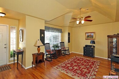 Formal living, gorgeous hardwood floor, vaulted ce