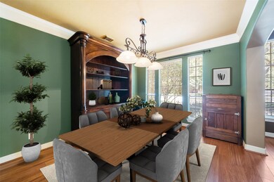 Formal Dining room with tons of natural light! Virtually staged