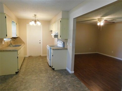 Galley Kitchen...Diningroom opens into the livingr